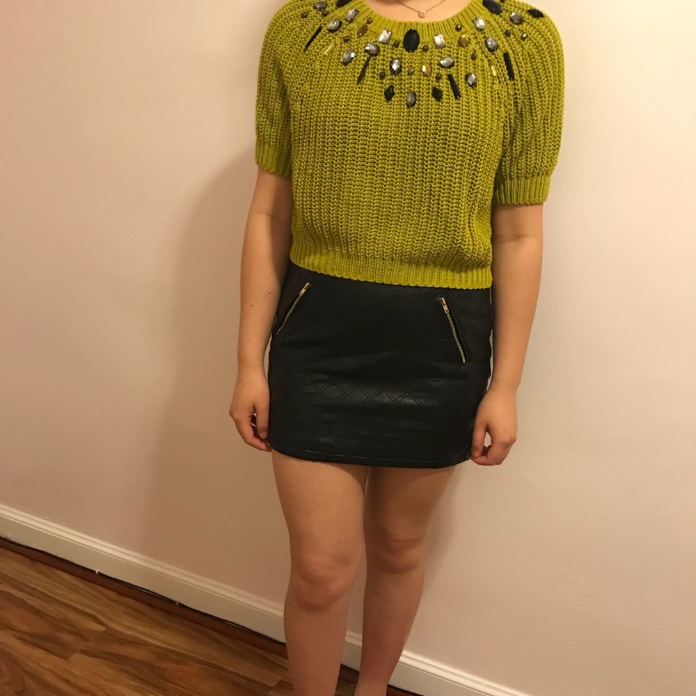 Olive top and black skirt